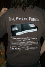Load image into Gallery viewer, Modern Brown VHS-themed Christian T-shirt with an oversized fit and nostalgic back graphic that may remind you of an old newspaper ad. Theme is based on Hebrews 13:8 that says, "Jesus Christ is the same yesterday today and forever."  Edit alt text
